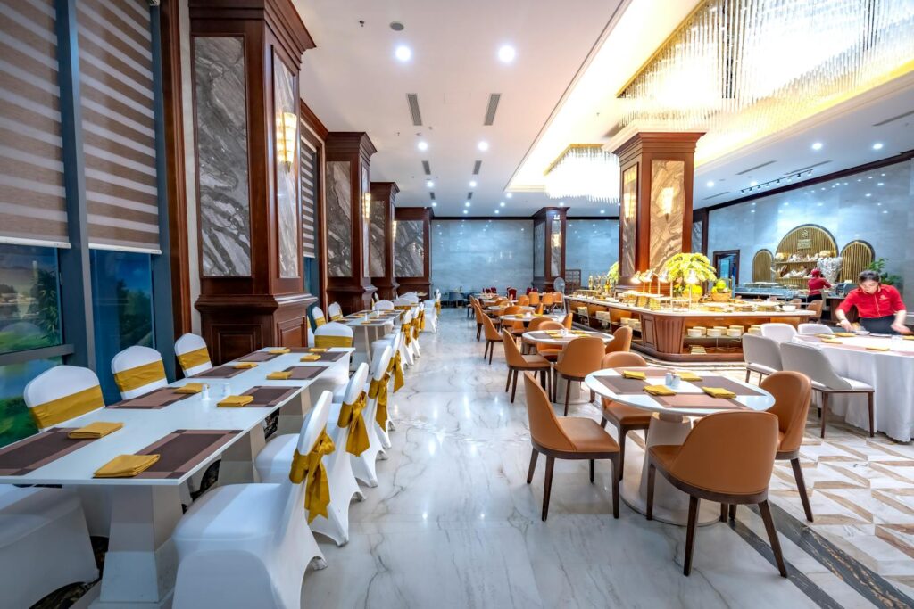 Spacious luxury restaurant with stylish decor and modern furnishings.