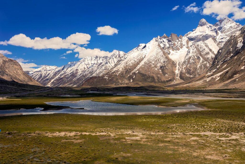 Majestic snow-capped mountains and green valleys in Kargil, Ladakh.