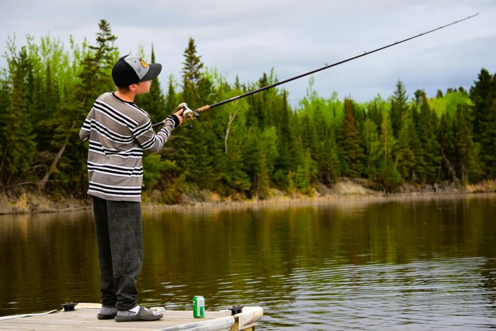 Free stock photo of boy, dock, fishing