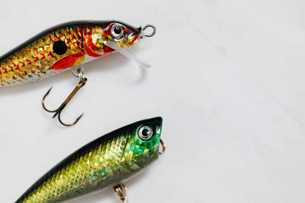 Bright and detailed fishing lures on a clean white surface.