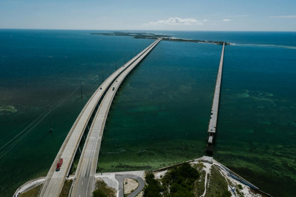 Aerial view of the iconic Seven Mile Bridge stretching over the clear blue waters of the Florida Keys.