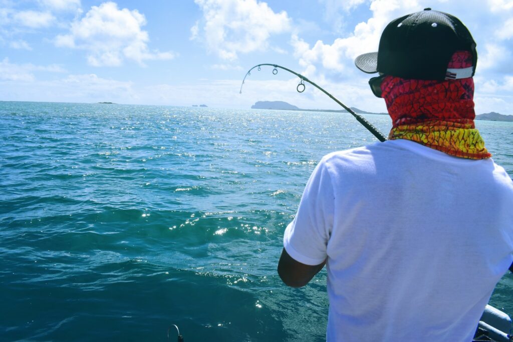 man holding fishing rod