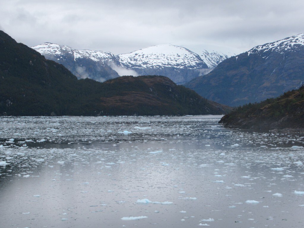 Ice off El Brujo Glacier clutters Asia Fjord in Parque Nacional Bernardo O'Higgins in southern Chile.