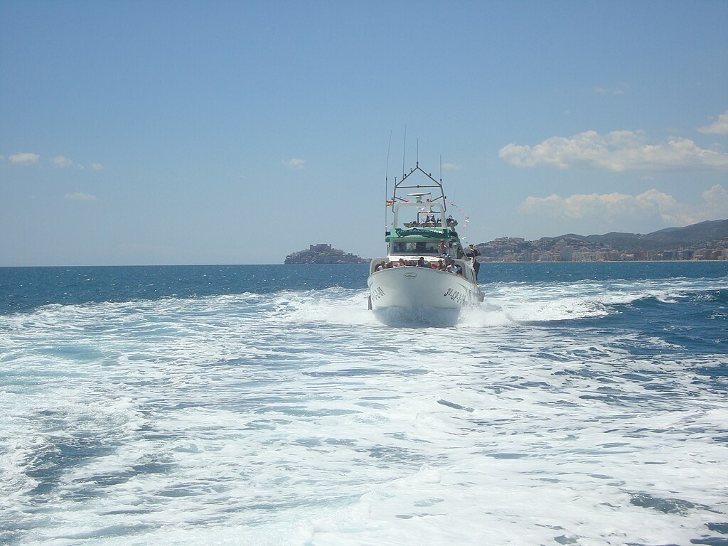 Fishing vessel sailing off the coast of Peñíscola and Benicarló.