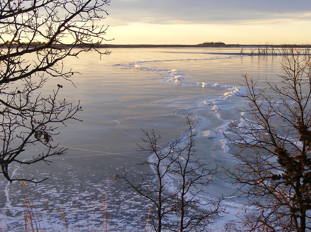 The morning sun highlights the ice outside Headquarters at Waubay National Wildlife Refuge in South Dakota.