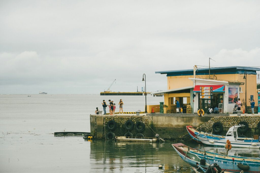 A group of people on a dock.
