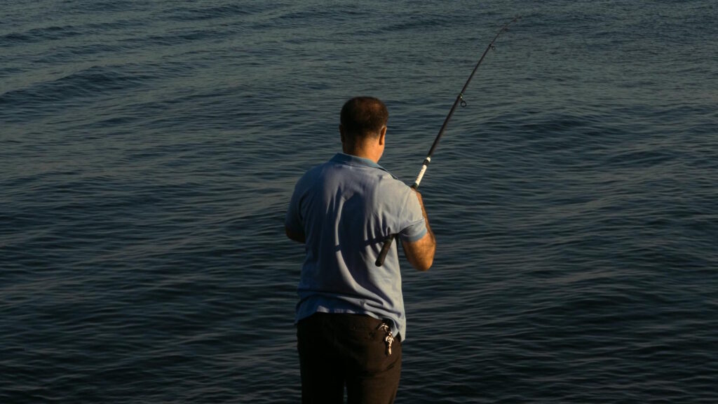 Person Fishing in the Ocean