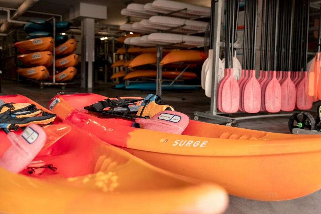 Two orange-and-red kayaks.