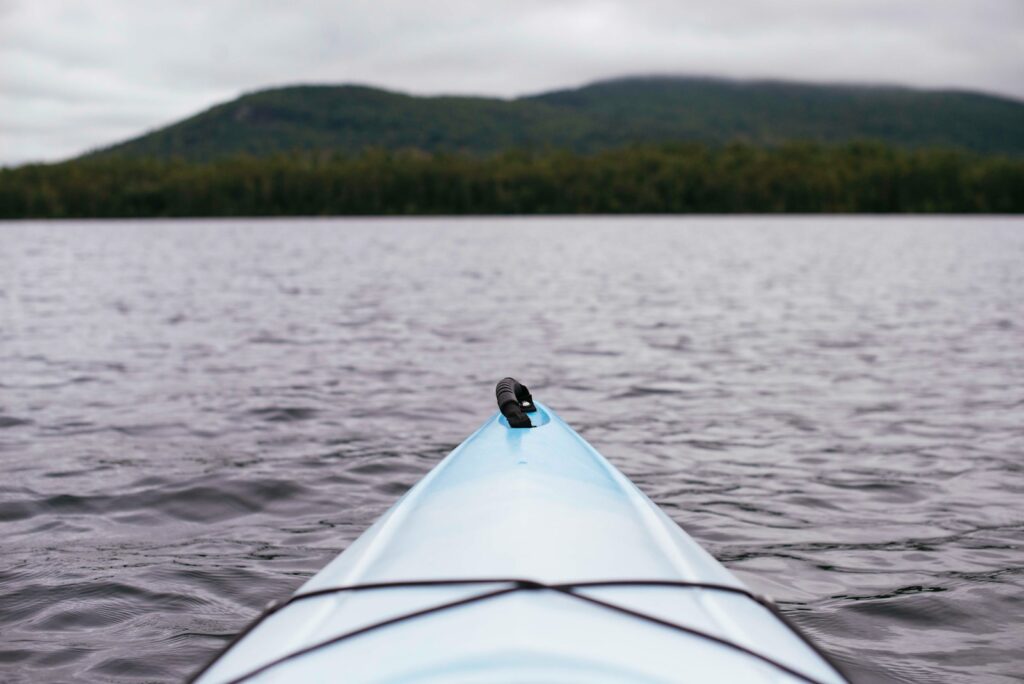 Point of view photography of kayak on water.