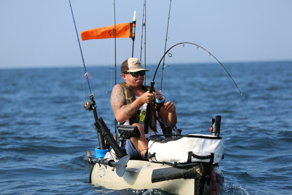a man fishing in a boat