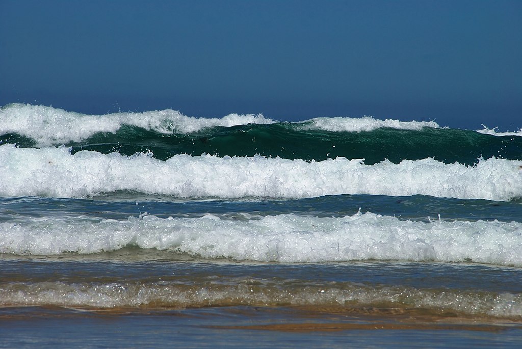 Breaking waves at the beach of Cerca Nova, Porto Covo, Portugal.